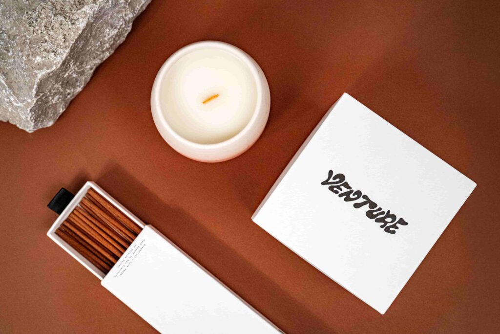 Venture's home fragrance set, including a candle and incense sticks