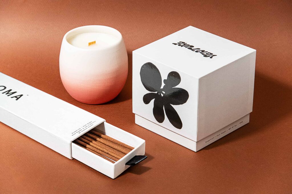 Custom boxes for Venture's home fragrance set. Artwork on the box has glossy black foiling.