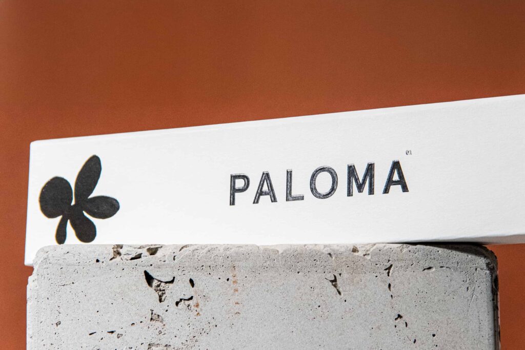 Custom rigid box for Venture's Paloma incense sticks. Text details has a gloss black foiling paired with embossing effect..